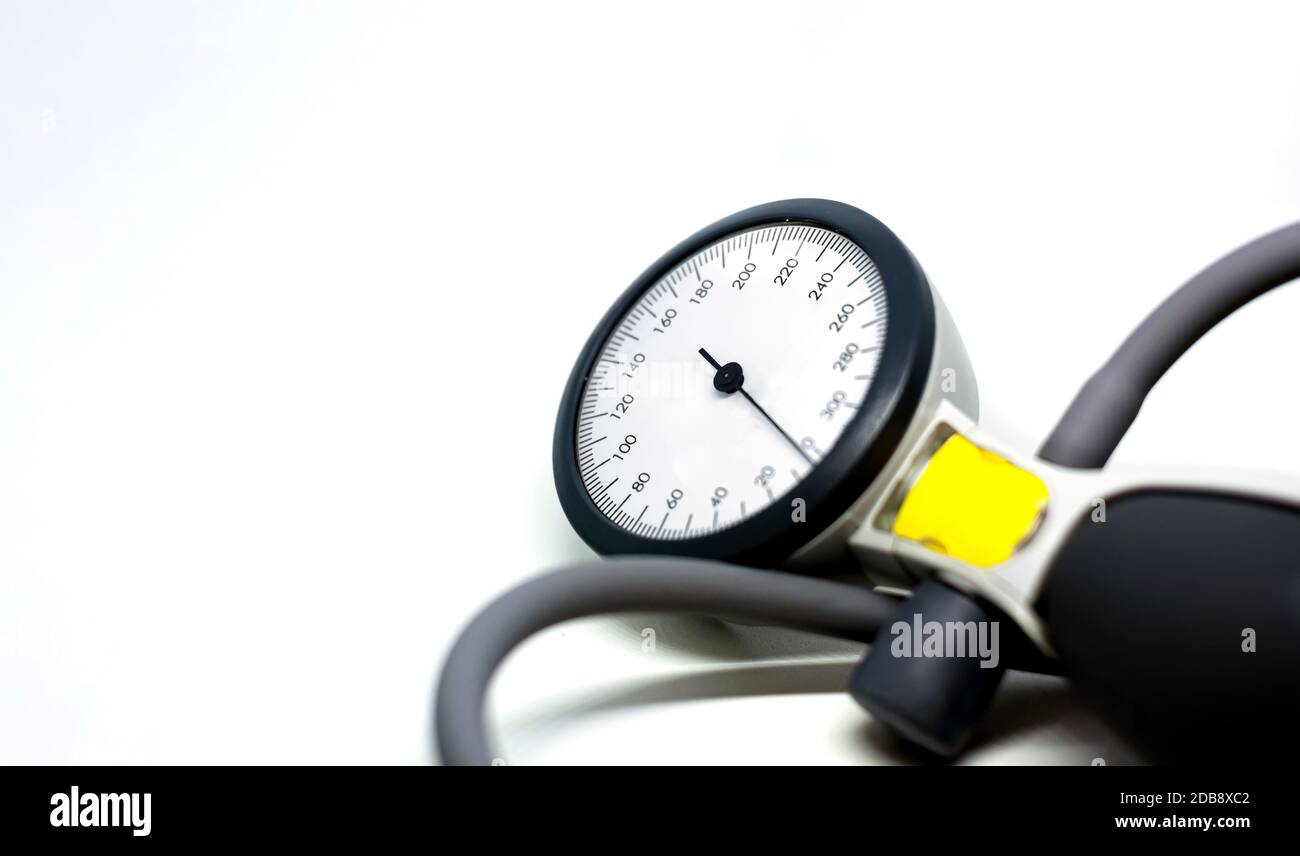 a portable sphygmomanometer isolated on a white background. Instrument