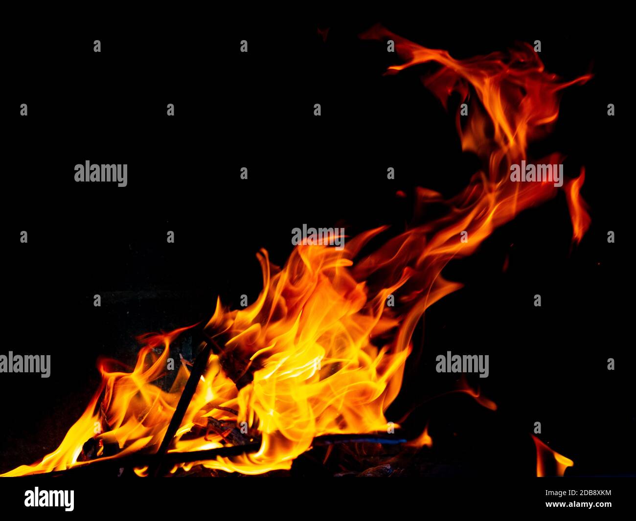 Hot fire with flames and black background Stock Photo - Alamy