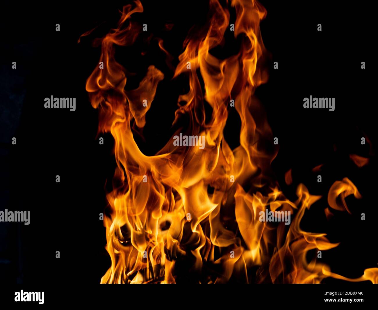 Hot fire with flames and black background Stock Photo - Alamy