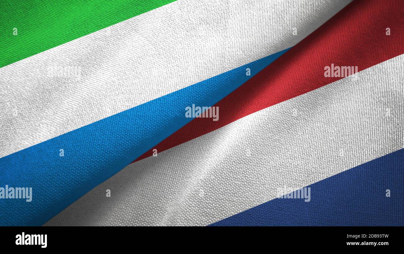 Sierra Leone and Netherlands two flags textile cloth, fabric texture Stock Photo