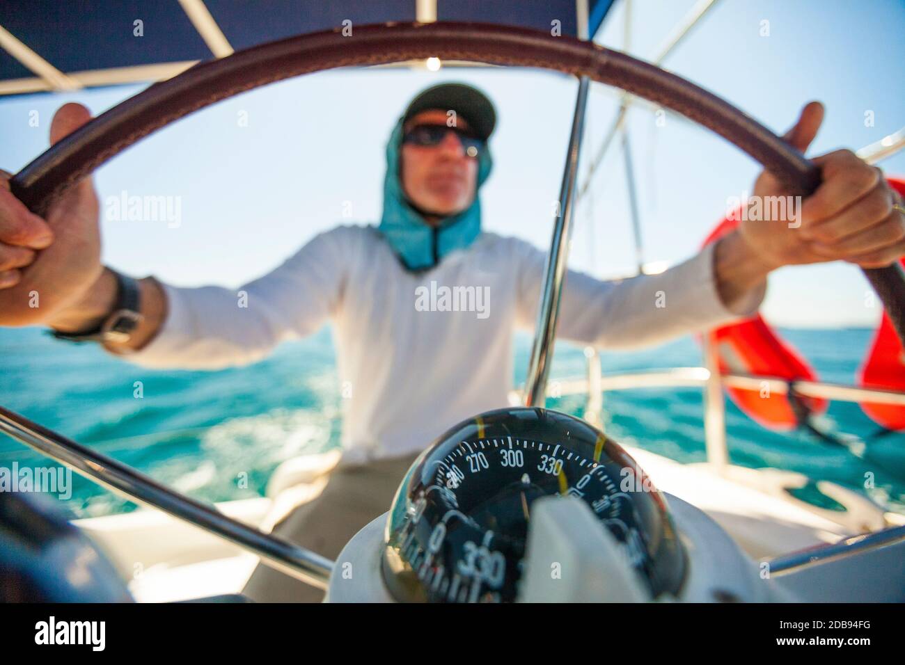 Mature man steering sea hi-res stock photography and images - Alamy