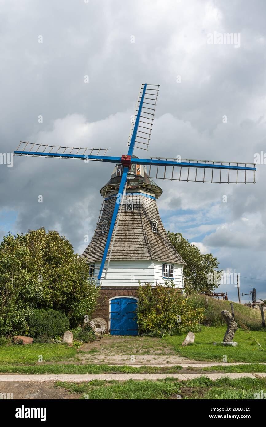 Historic Windmill in Rural Landscape in North Frisia, Schleswig-Holstein, Germany Stock Photo