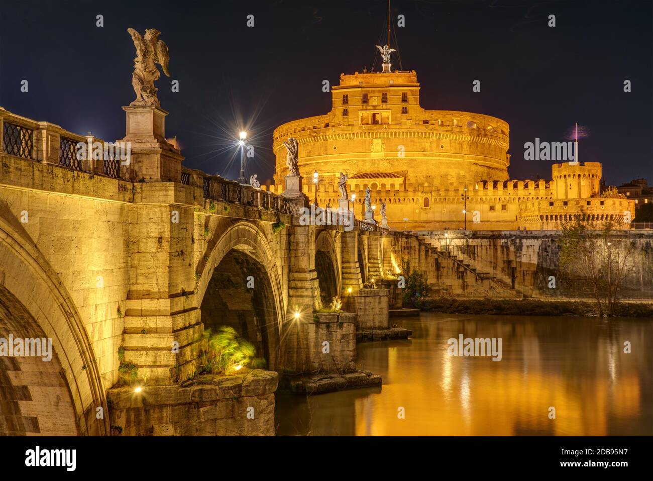 The famous Castel Sant Angelo and the Sant Angelo bridge in Rome, Italy, at night Stock Photo