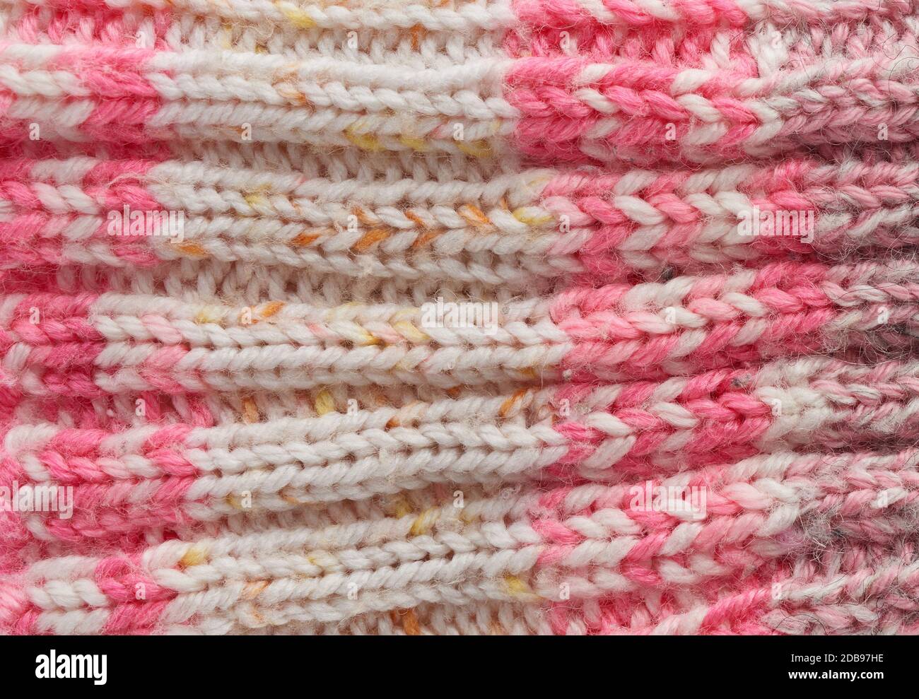 knitted pink texture, full frame, warm woolen clothes, close up Stock Photo