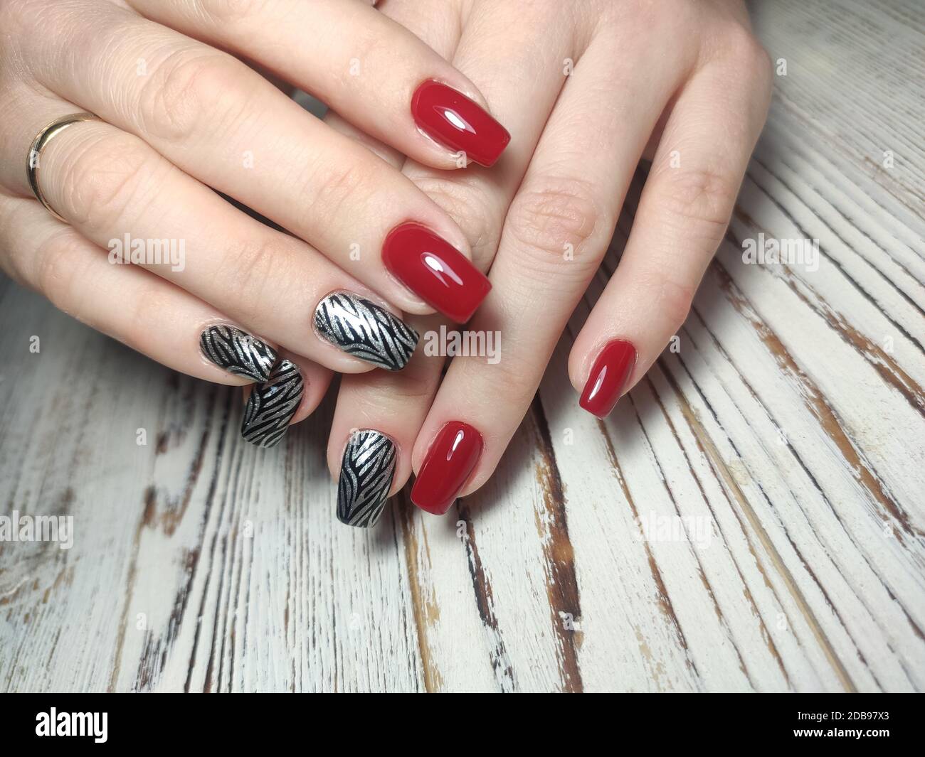 Closeup photo of a beautiful female hands with elegant manicure and ...