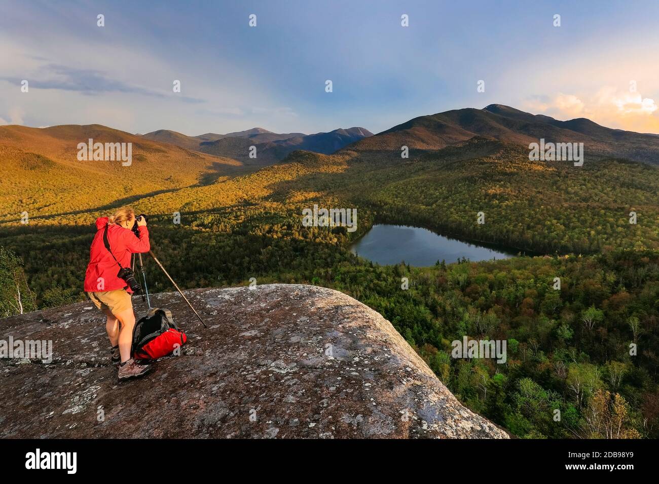 Honora Bauman on Mount Jo photographing Heart Lake, Adirondacks, New York Stock Photo