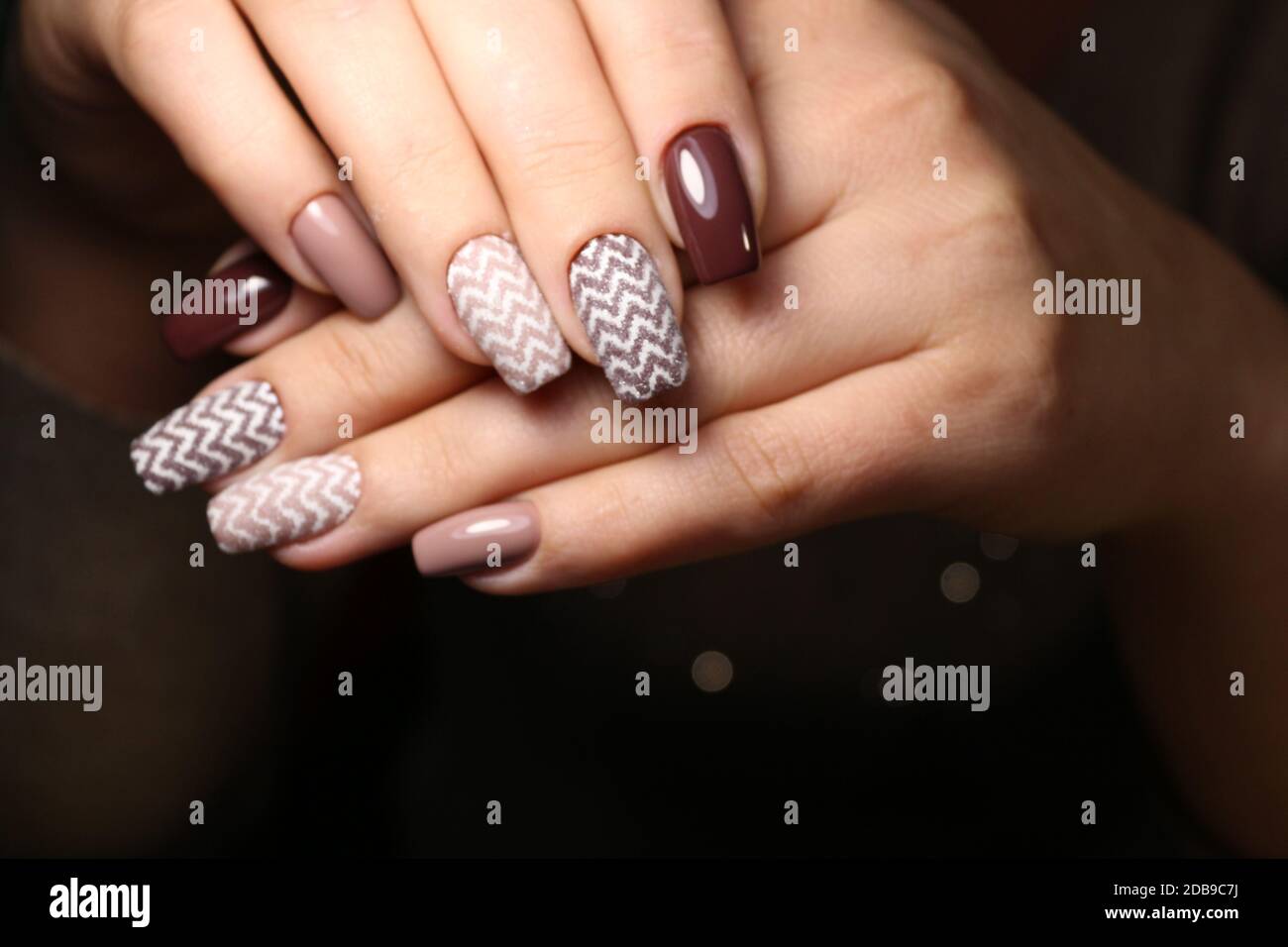 Closeup photo of a beautiful female hands with elegant manicure and ...