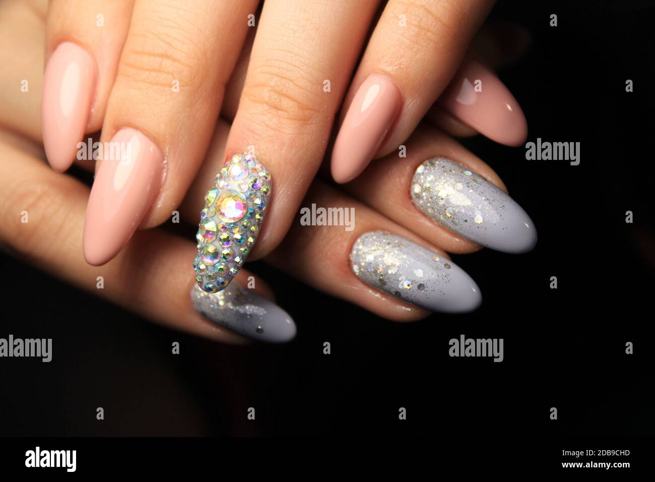 Colorful Christmas nails winter nail designs with glitter, rhinestones,  Stock Photo, Picture And Low Budget Royalty Free Image. Pic. ESY-055058444  | agefotostock