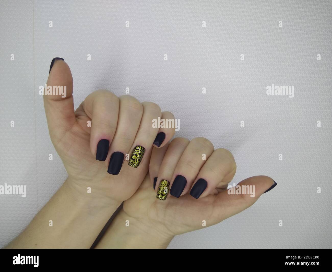 Closeup photo of a beautiful female hands with elegant manicure and ...