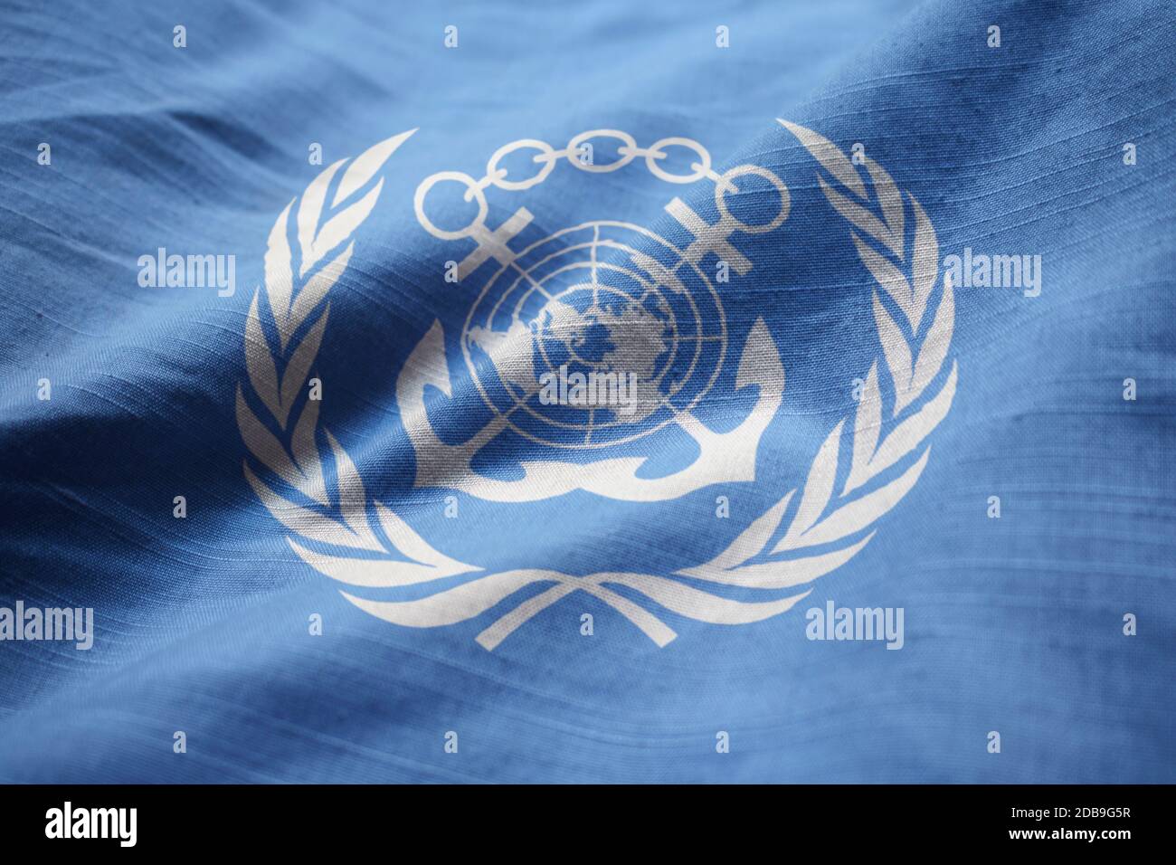 Closeup of Ruffled International Maritime Organization Flag, International Maritime Organization Flag Blowing in Wind Stock Photo