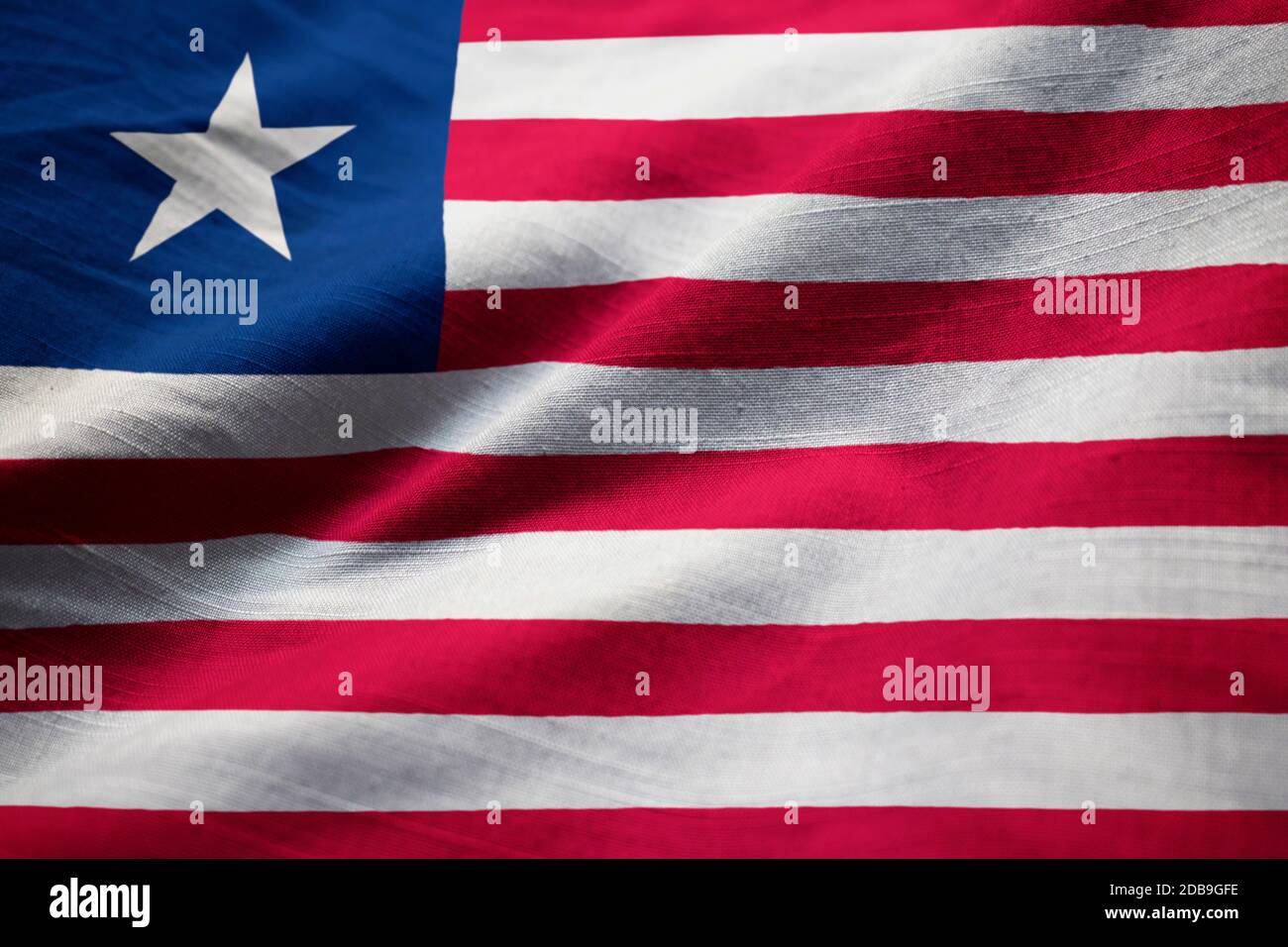 Closeup of Ruffled Liberia Flag, Liberia Flag Blowing in Wind Stock Photo