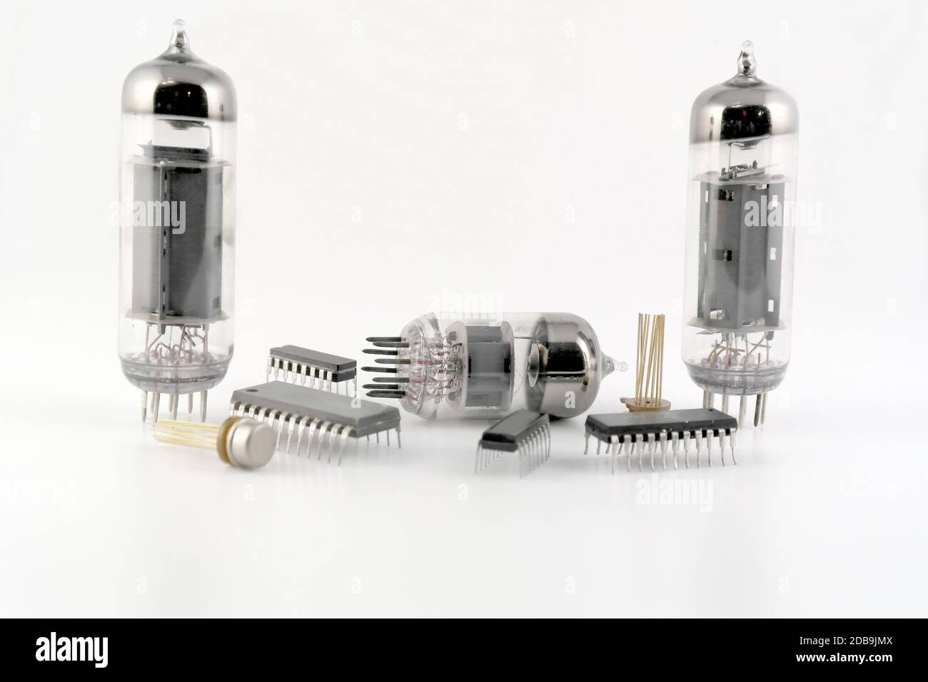 Vacuum radio tubes and semiconductor chips over white Stock Photo Alamy