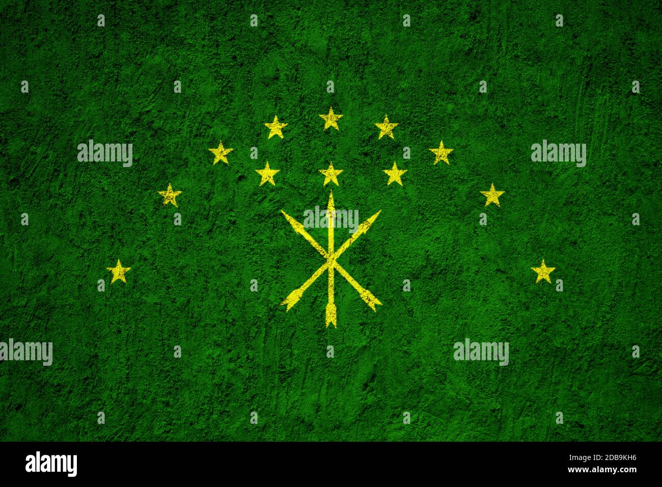 Adygea flag painted on the cracked grunge concrete wall Stock Photo