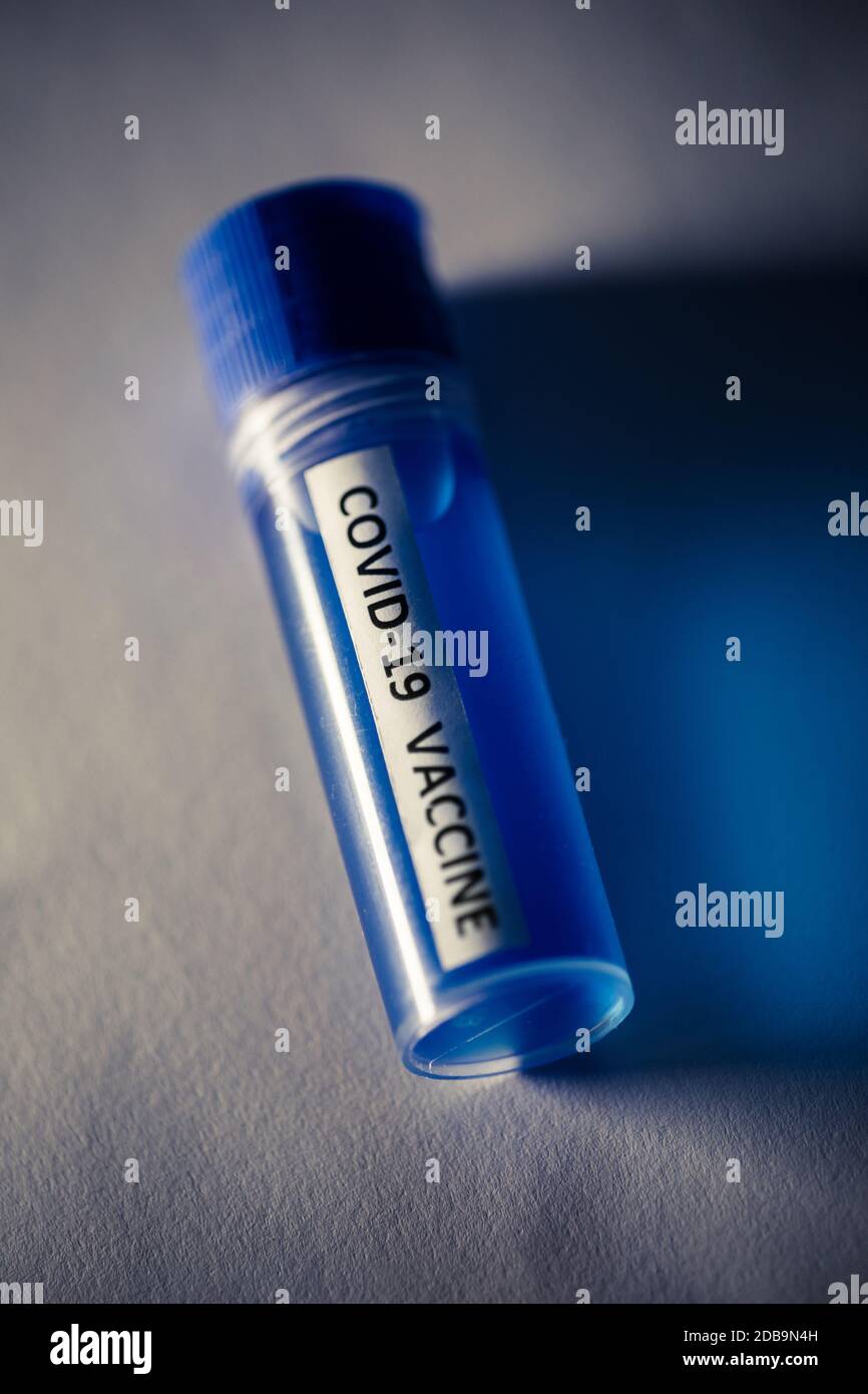 Conceptual image of a recipient containing a vaccine for coronavirus ...