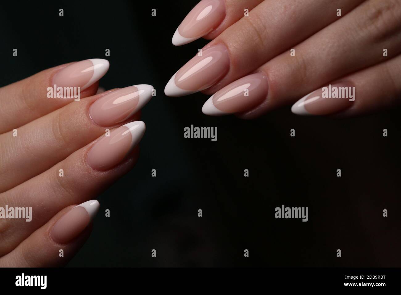 Closeup photo of a beautiful female hands with elegant manicure and ...