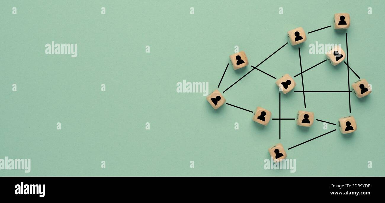 Abstract teamwork, network and community concept on a green paper ...