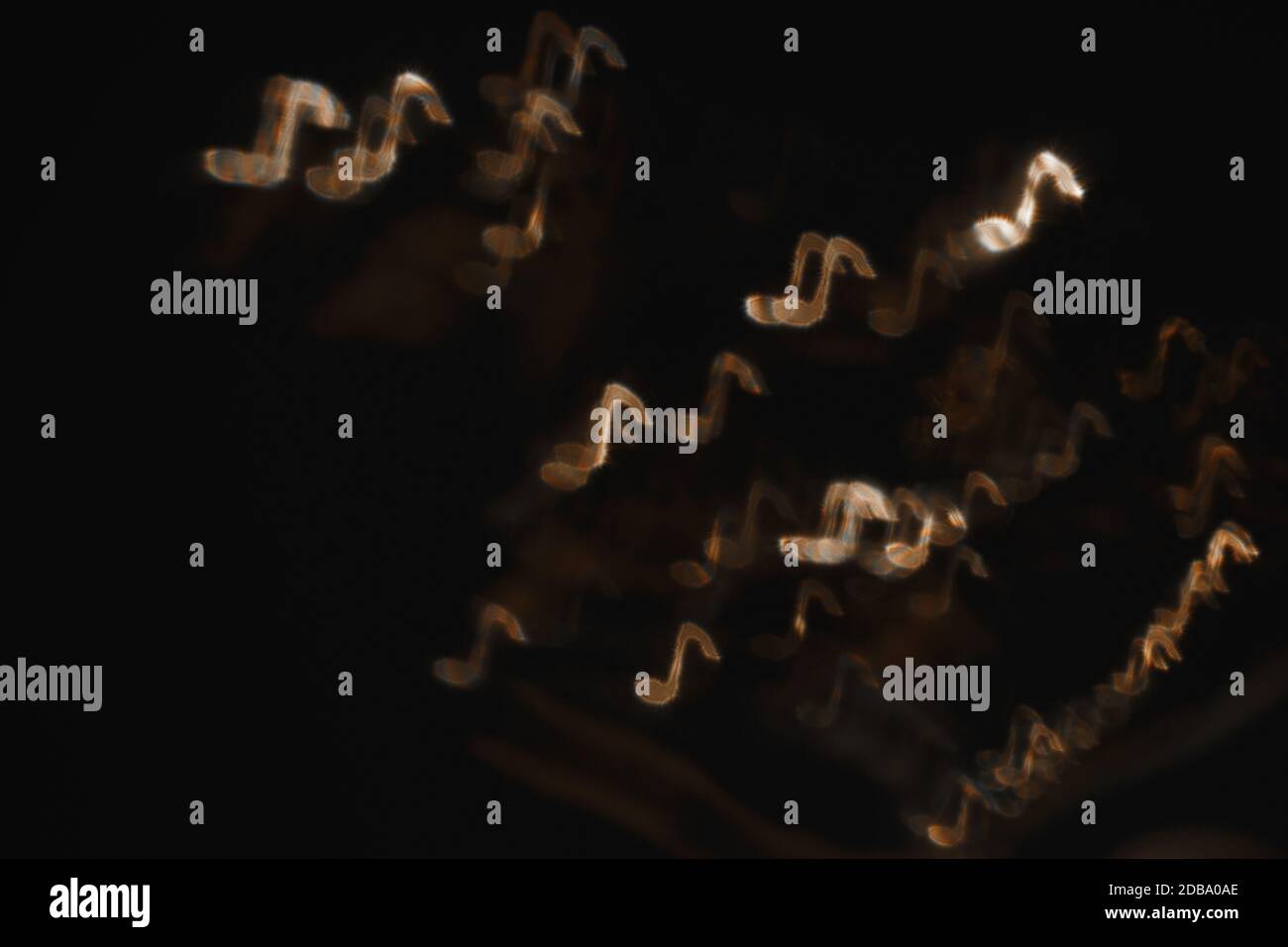 Gold notes on black background Stock Photo