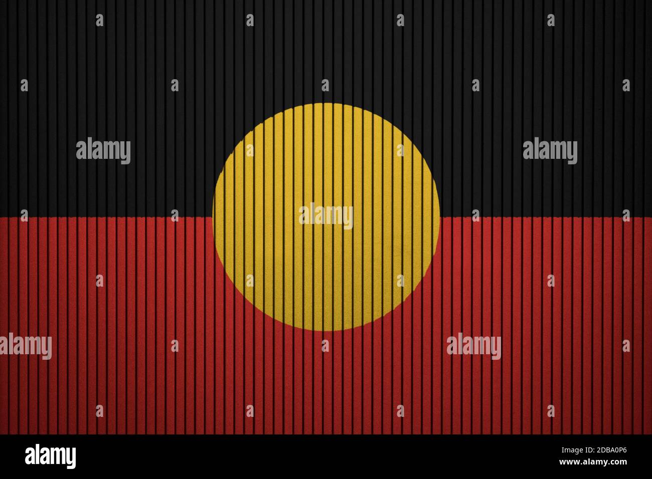 Australian Aboriginal flag painted on the cracked grunge concrete wall ...
