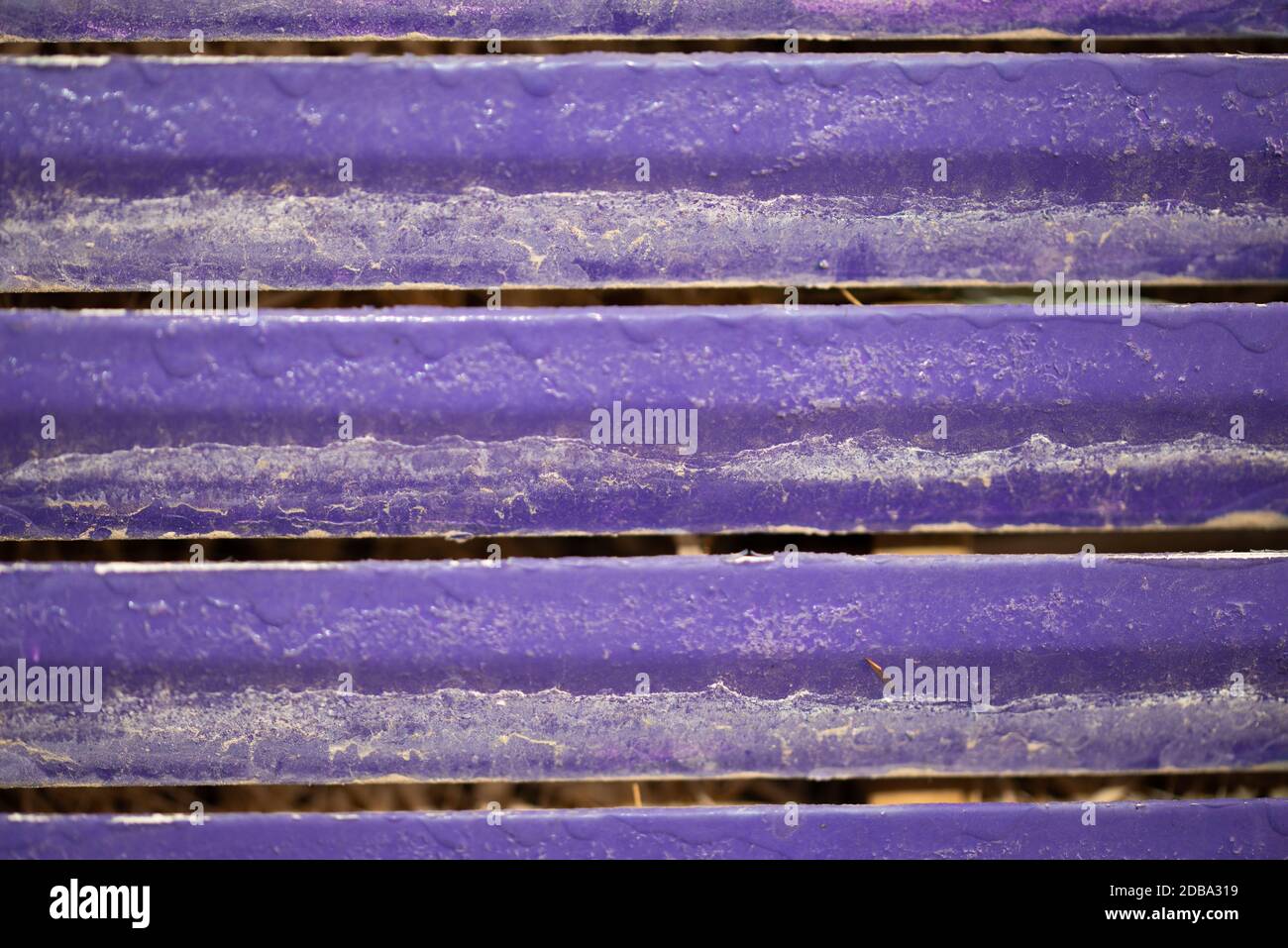 Dusty bright purple aluminium baars. Stock Photo