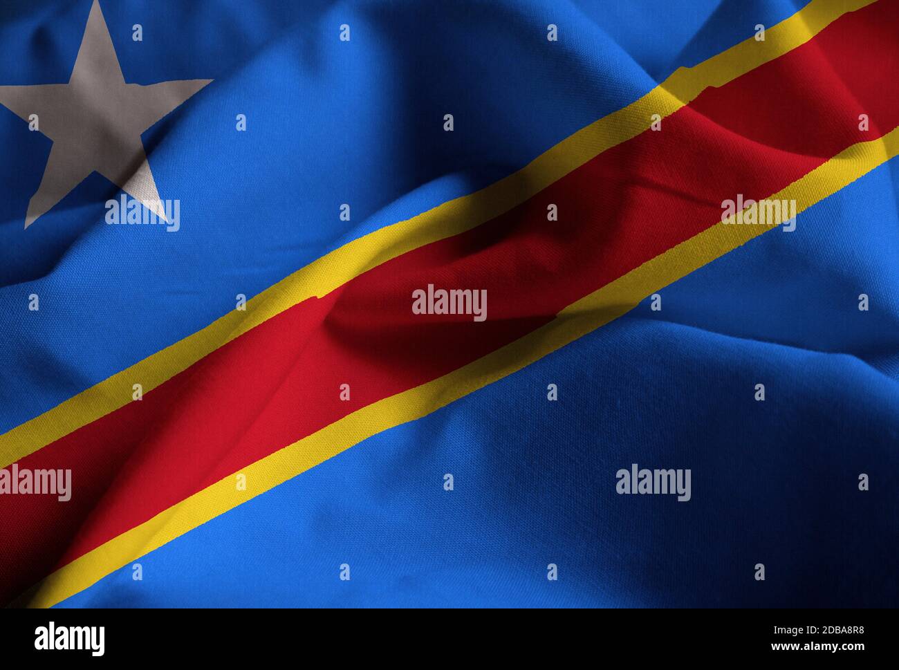 Closeup of Ruffled Democratic Republic of the Congo Flag, Democratic Republic of the Congo Flag Blowing in Wind Stock Photo