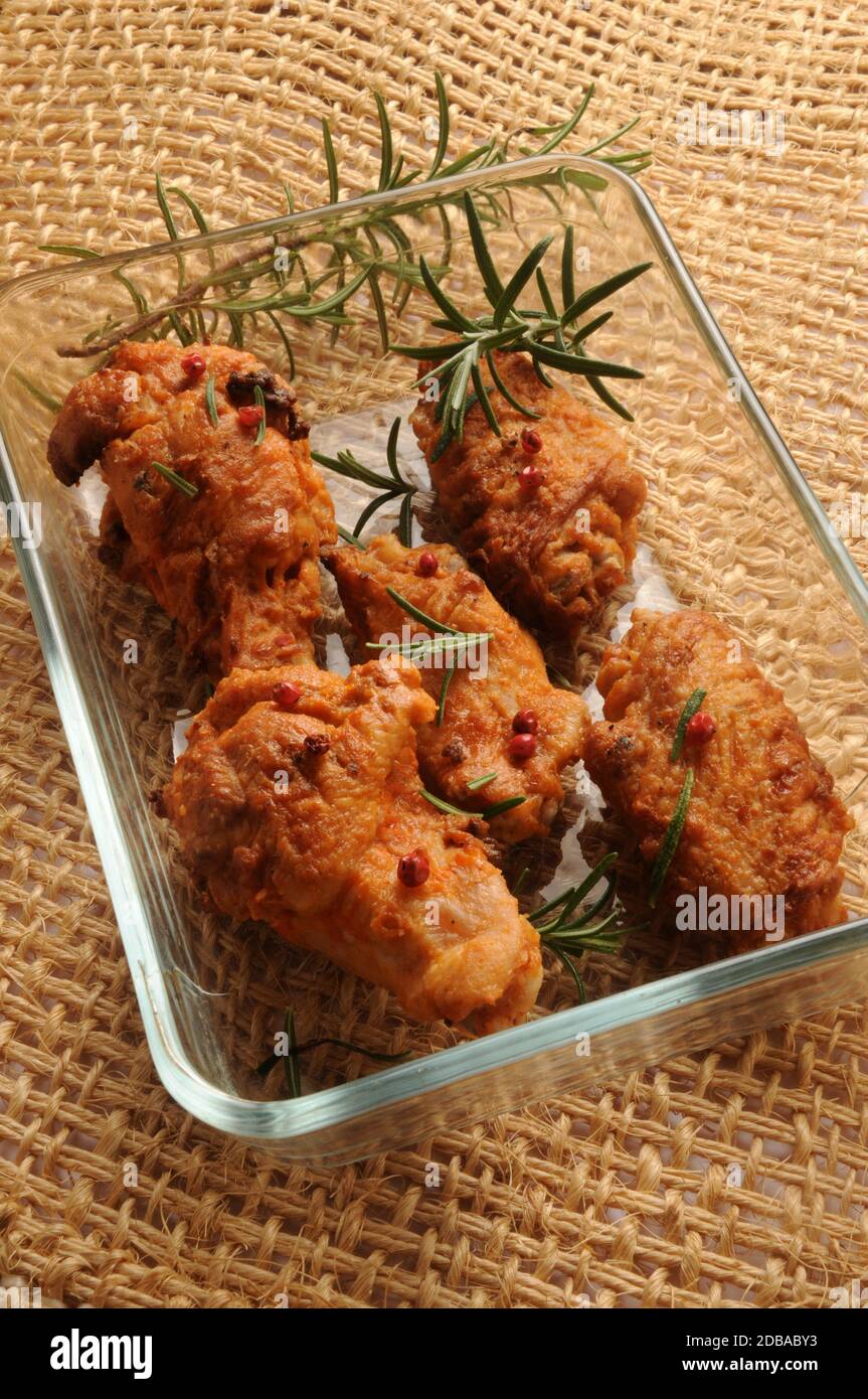 Breaded baked chicken in the baking dish Stock Photo