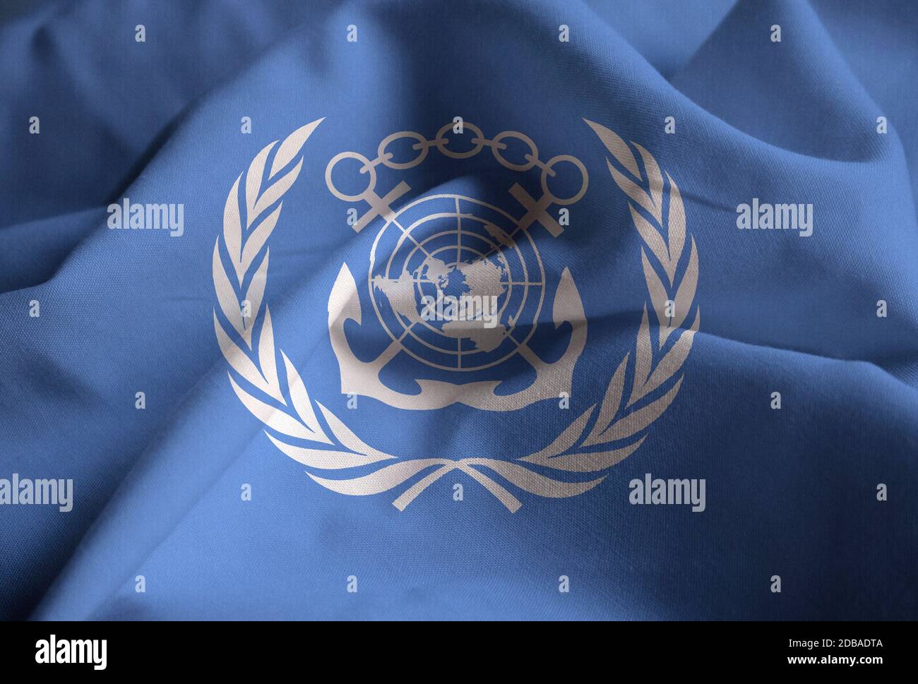 Closeup of Ruffled International Maritime Organization Flag, International Maritime Organization Flag Blowing in Wind Stock Photo