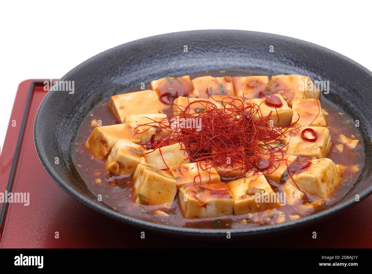 Chinese cuisine mapo tofu in a dish on wooden tray Stock Photo