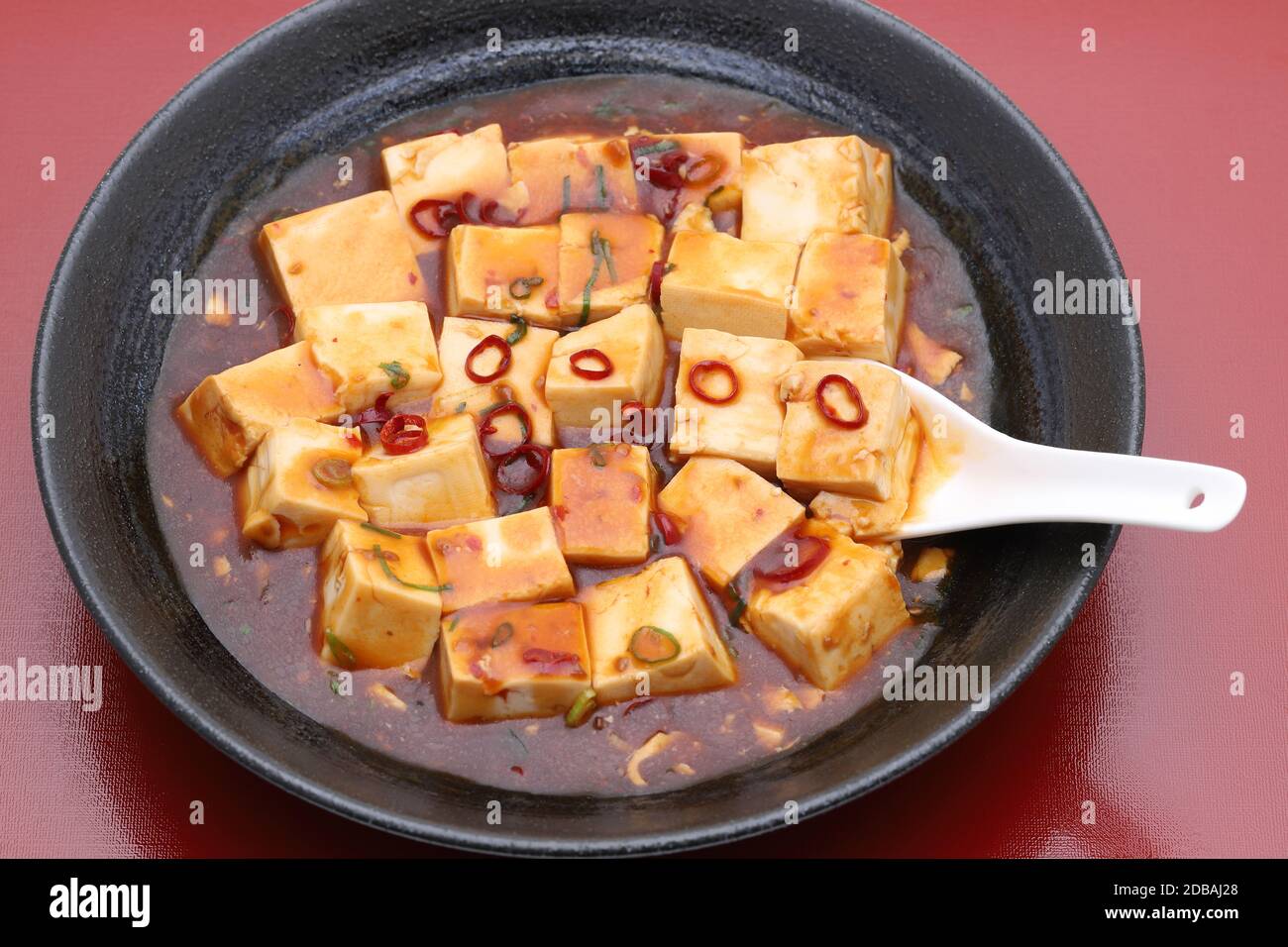 Close up of Chinese cuisine mapo doufu with renge on tray Stock Photo