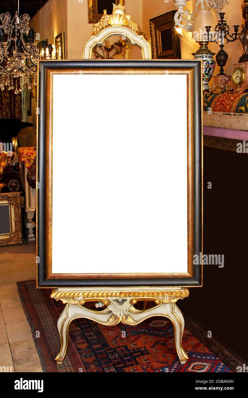 Floor easel with empty frame isolated included clipping path Stock Photo