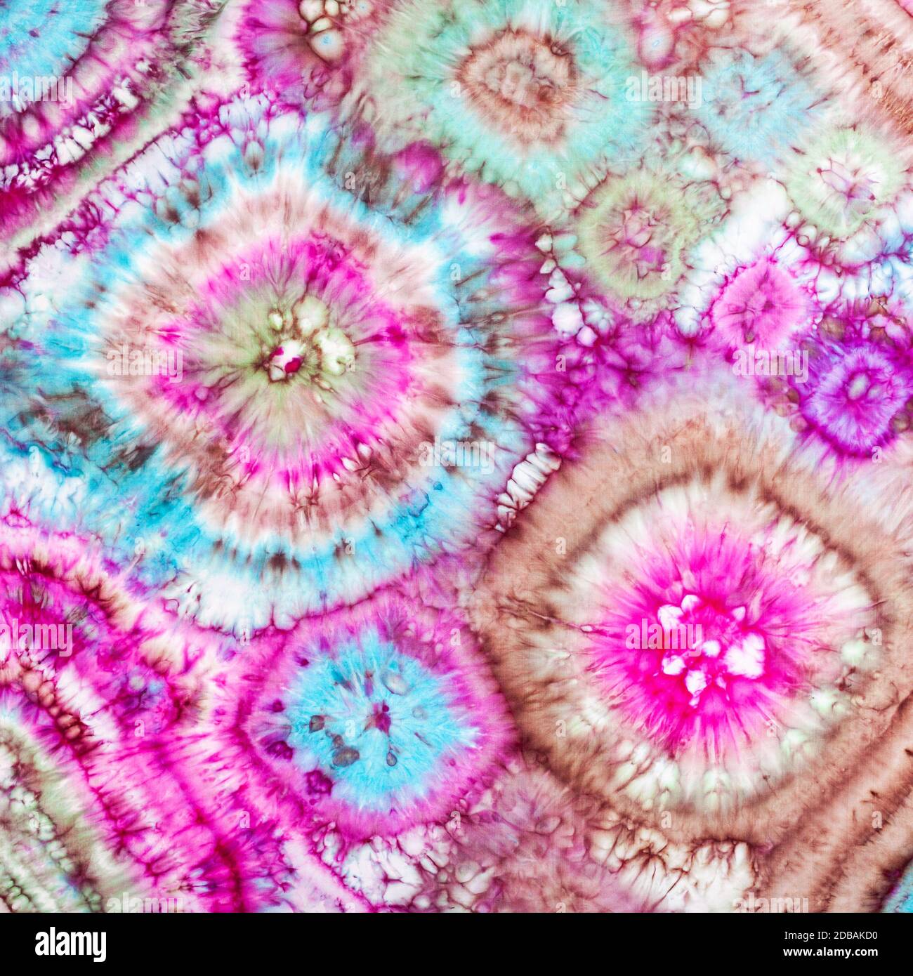 abstract bright pattern in tie-dye batik technique handpainted on silk head scarf Stock Photo