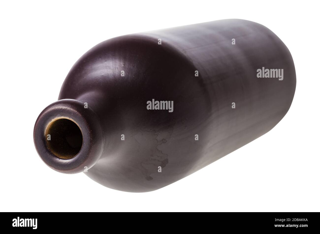 overturned black ceramic bottle isolated on white background Stock Photo
