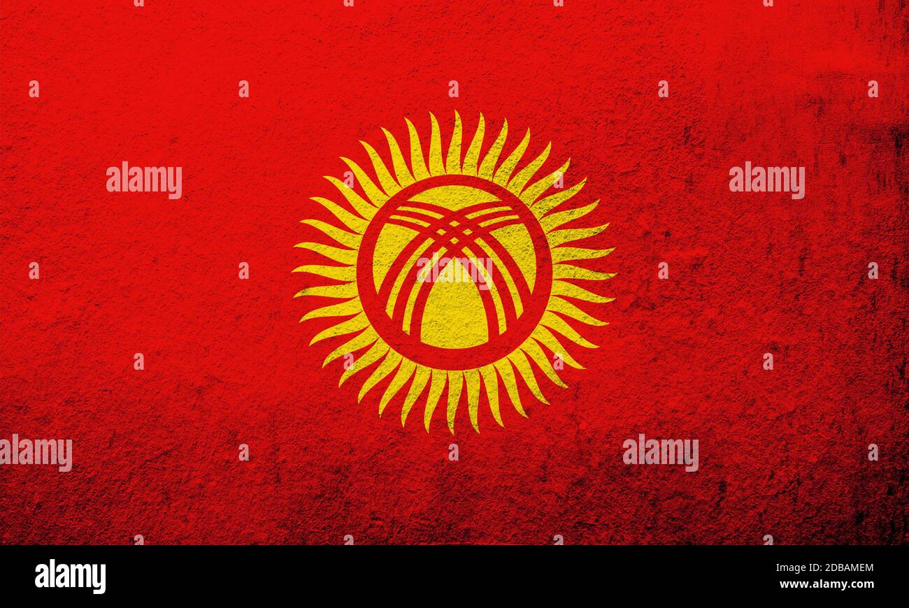 The Kyrgyz Republic (Kyrgyzstan) National flag. Grunge background Stock Photo