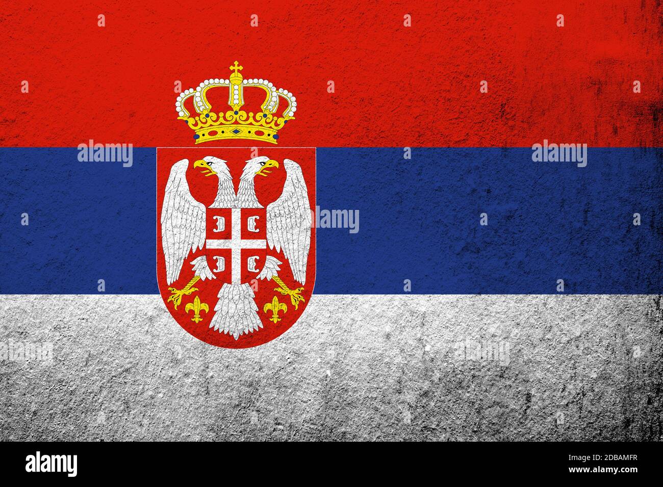 The Republic of Serbia National flag. Grunge background Stock Photo