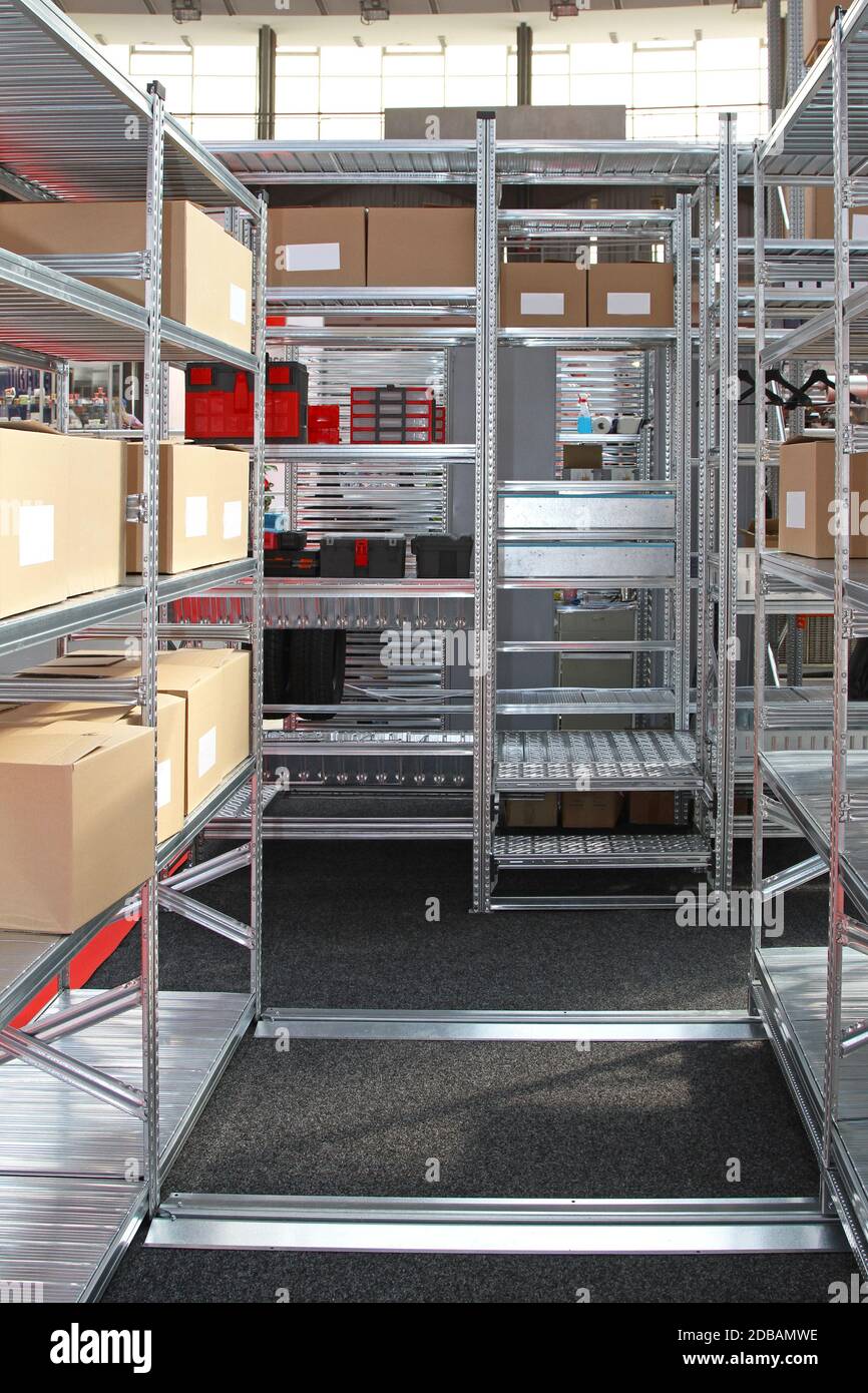 Modular Metal Shelving System in Storage Warehouse Stock Photo Alamy