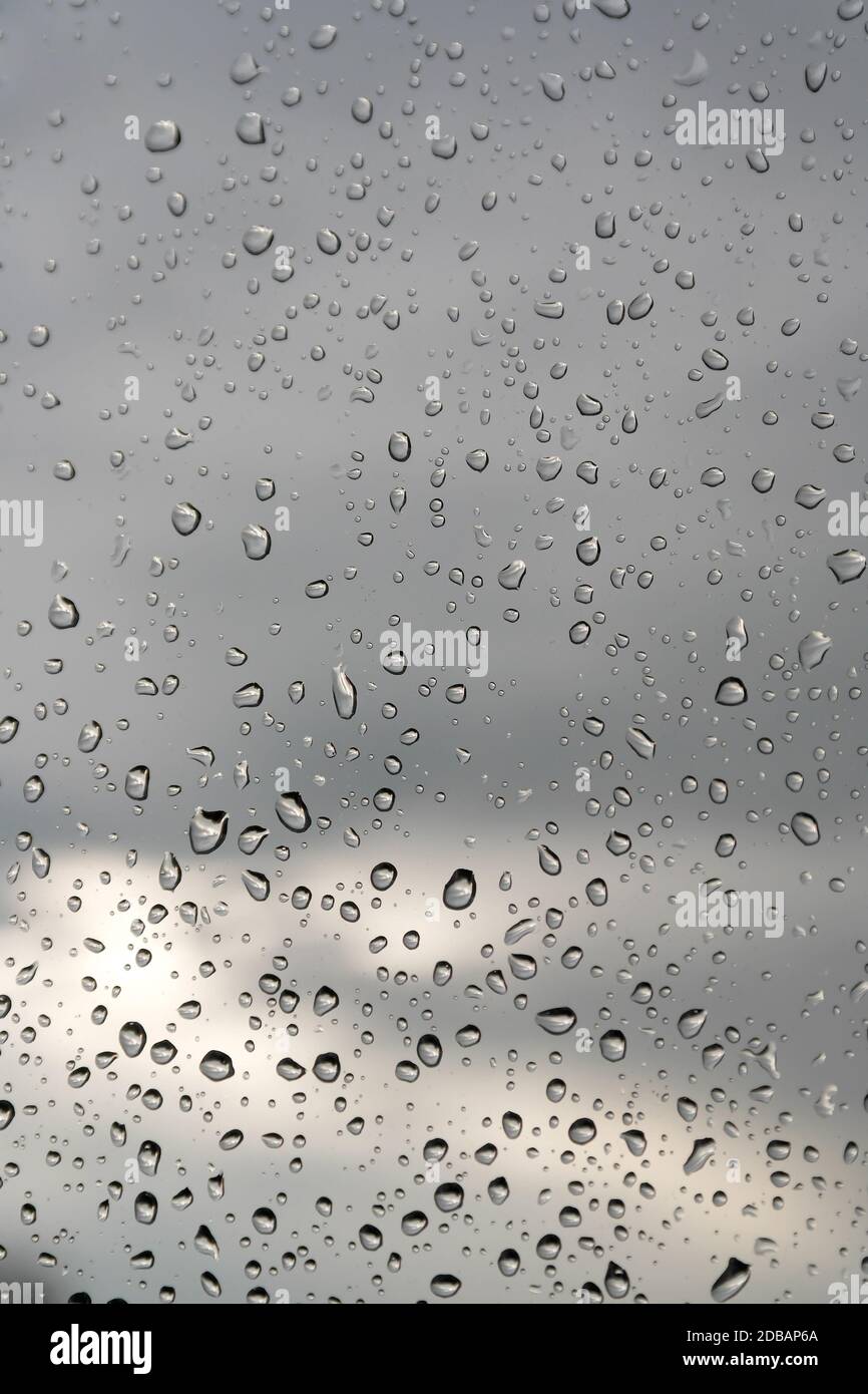 Abstract background, water drops on a window glass, rainy day Stock ...