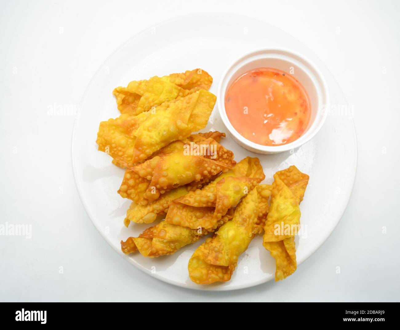 Deep Fried Won ton on white plate with dip source Stock Photo