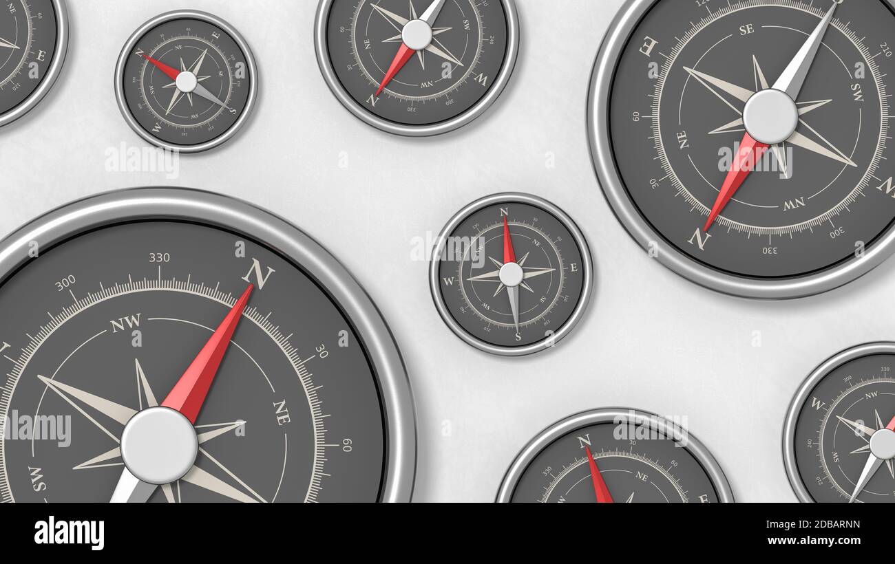 Many Metallic Compasses with Red Needle Pointing in Different
