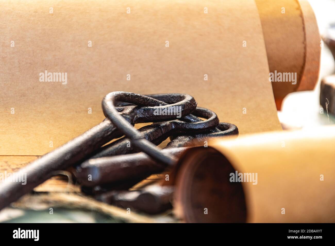 old keys and symbols in wood and with little natural light Stock Photo