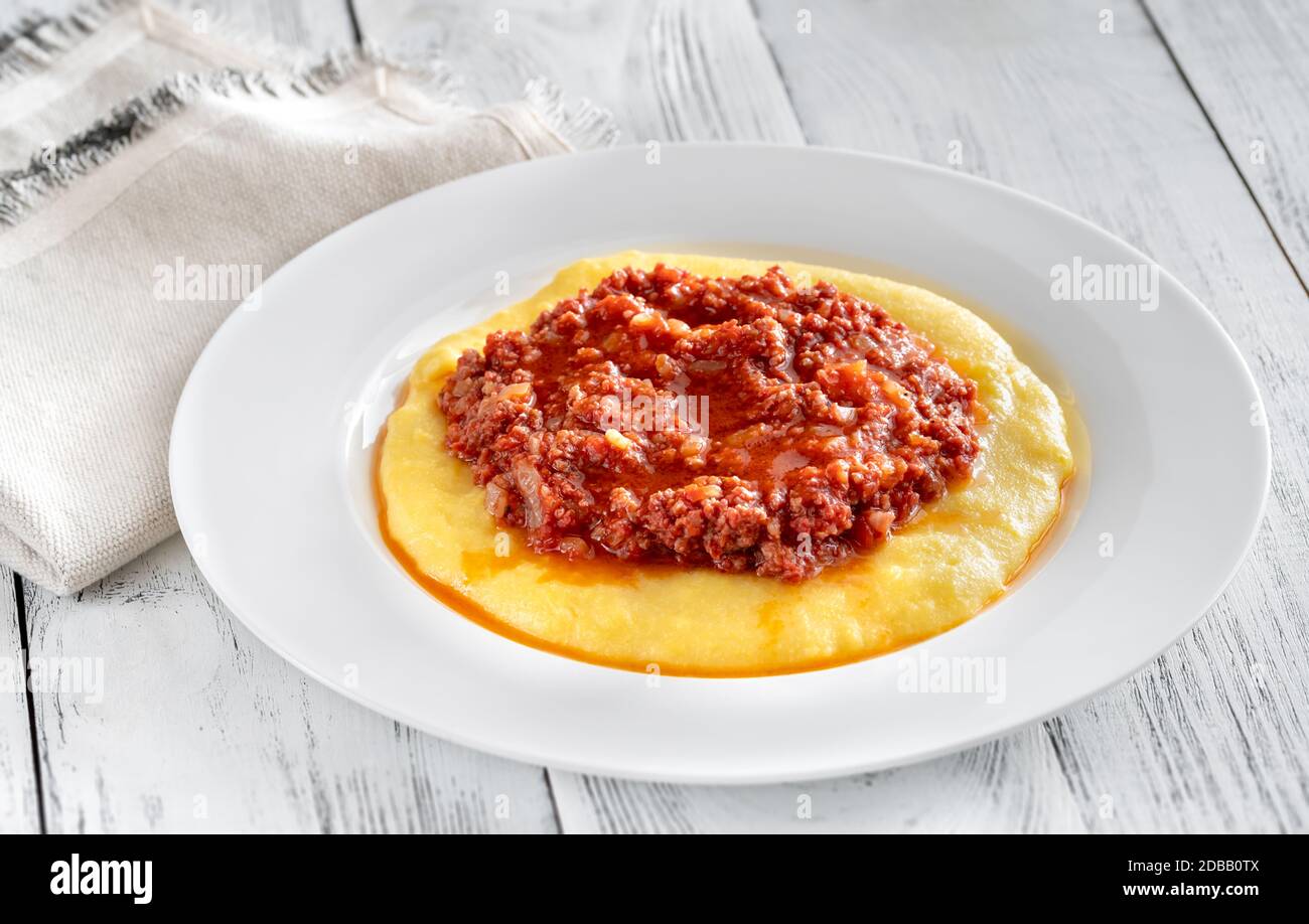 Italian cornmeal polenta with bolognese sauce Stock Photo Alamy