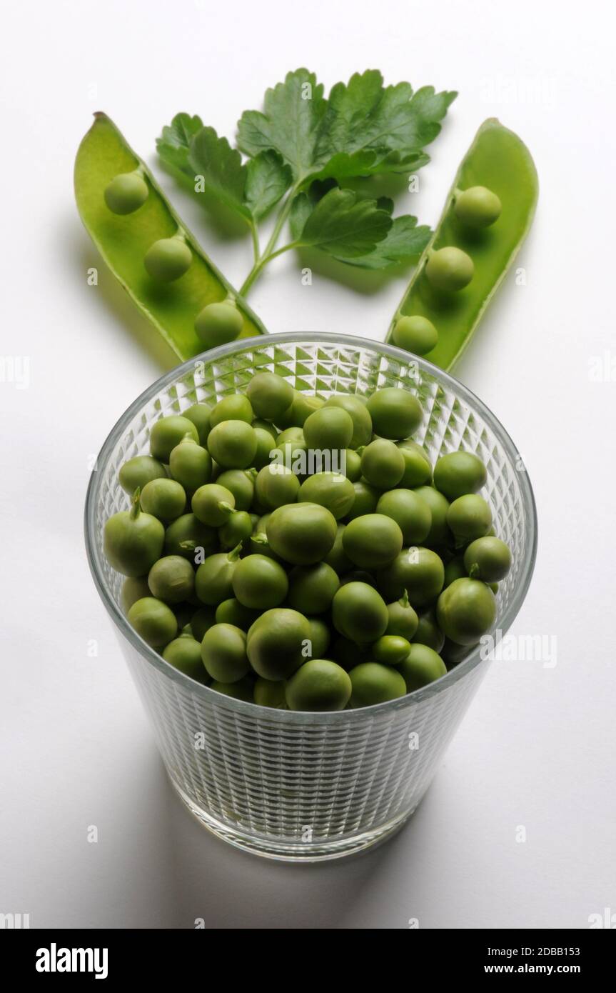Full glass of fresh peas Stock Photo