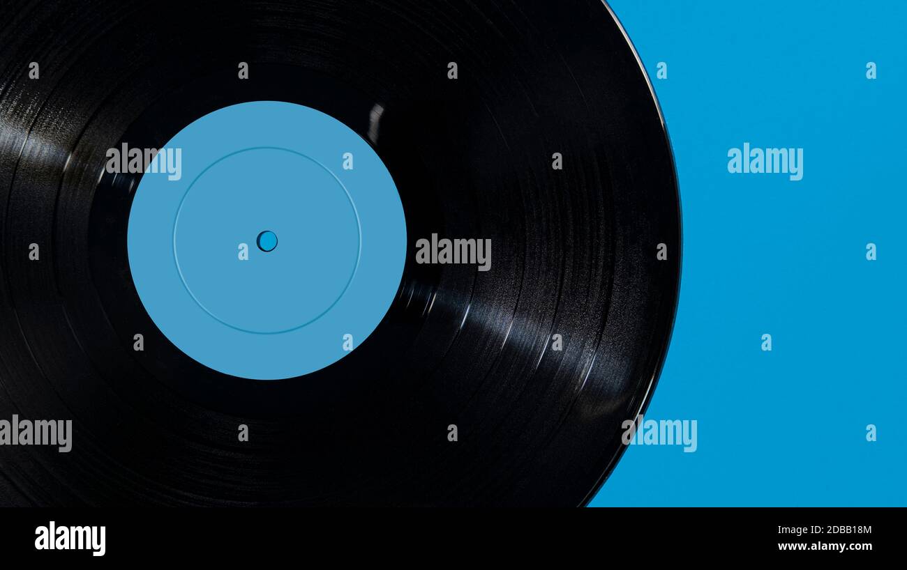 Vintage record on blue background Stock Photo