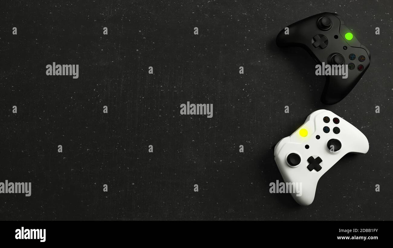Game competition. White and black joystick with black stone background ...