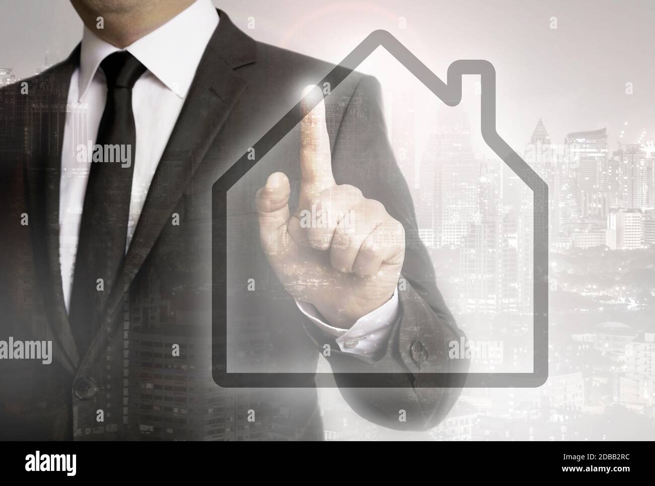 Businessman with city background house concept concept Stock Photo - Alamy