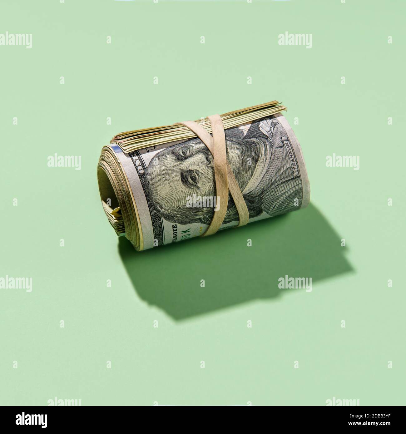 Roll of US dollar bills Stock Photo