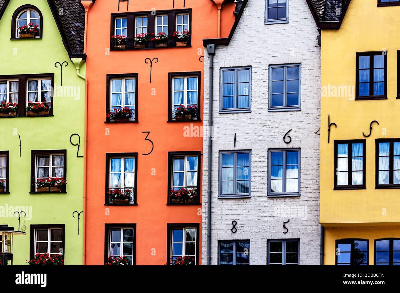 a-row-of-colorful-houses-at-the-rhine-promenade-in-cologne-germany