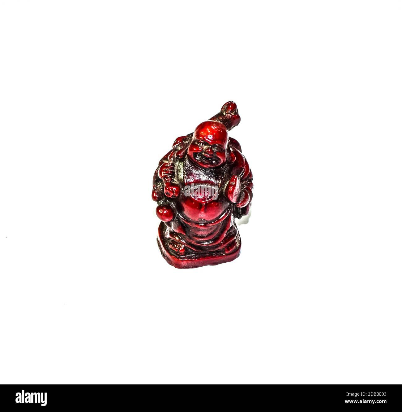Little red buddha statue. The symbol of Buddhism is a fat buddha Stock