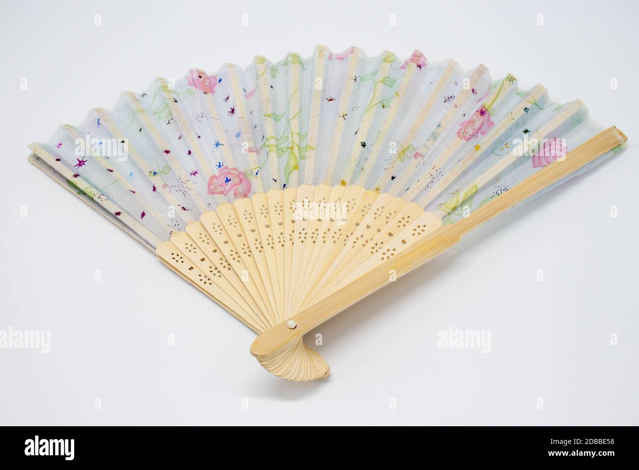 Wooden fan with color pattern Stock Photo - Alamy