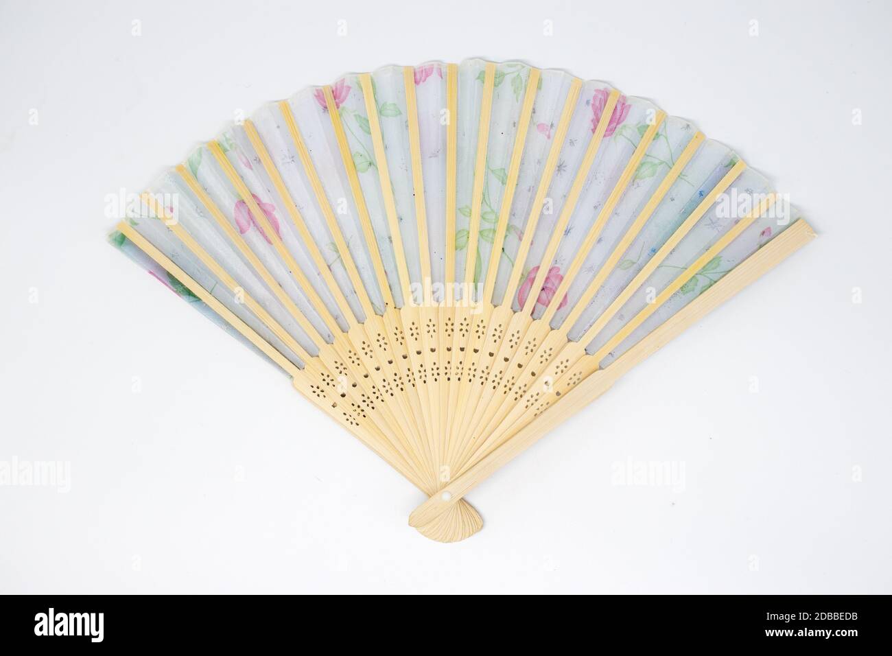Wooden fan with color pattern Stock Photo - Alamy