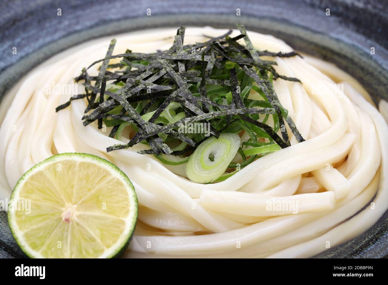 Close up of Japanese bukkake udon noodles in a bowl Stock Photo