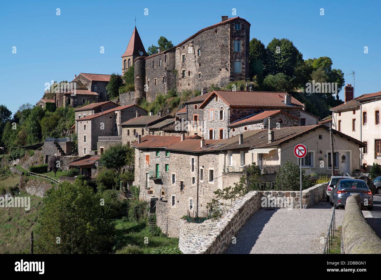 Picturesque village of Saint Privat d'Allier in Auvergne in France with stone houses and a church Stock Photo
